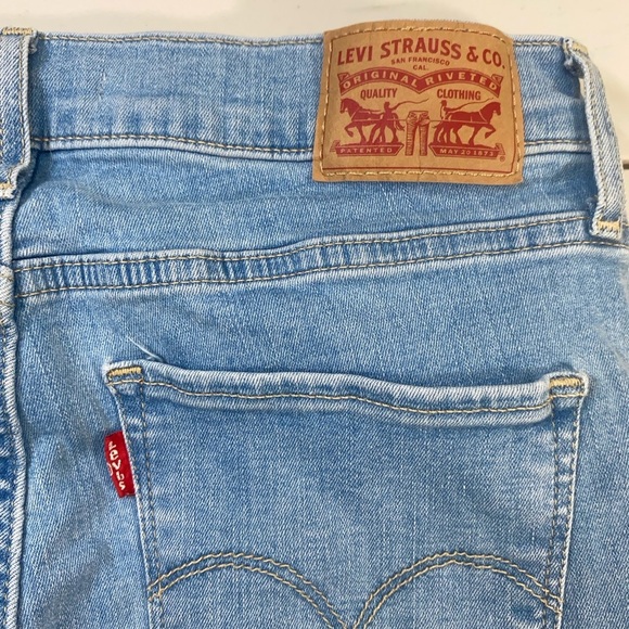 Levi's Classic Blue Straight Leg Jeans with Distressed Details - Picture 4 of 12